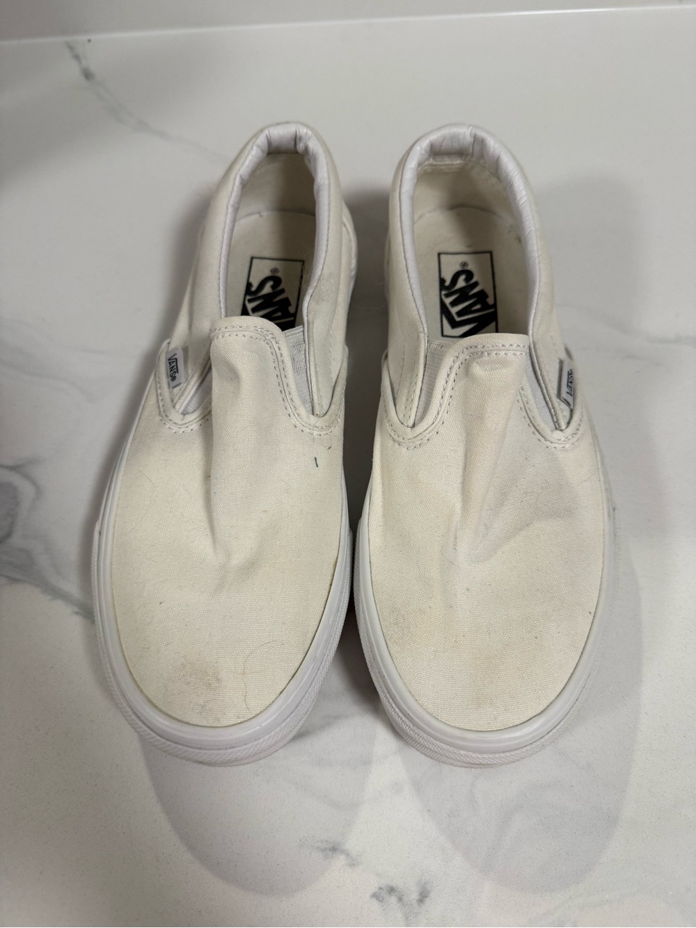 Vans women’s Slip-On Sneakers in Off-White